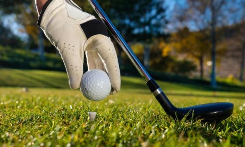 a person playing golf